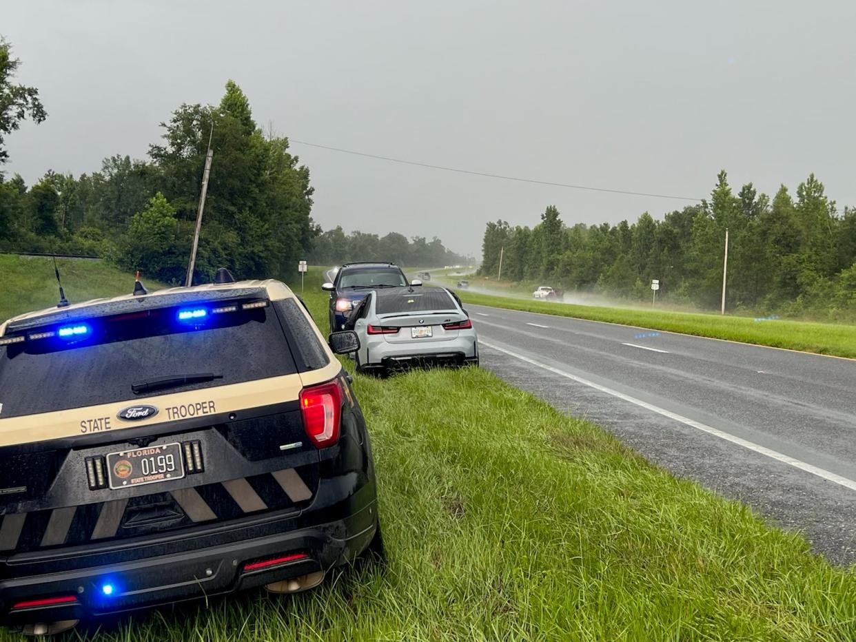 Florida Highway Patrol officials announced that a Georgia man was arrested after he allegedly stole a 2022 gray BMW and led Bay County law enforcement on a high-speed chase into Jackson County on Saturday afternoon.