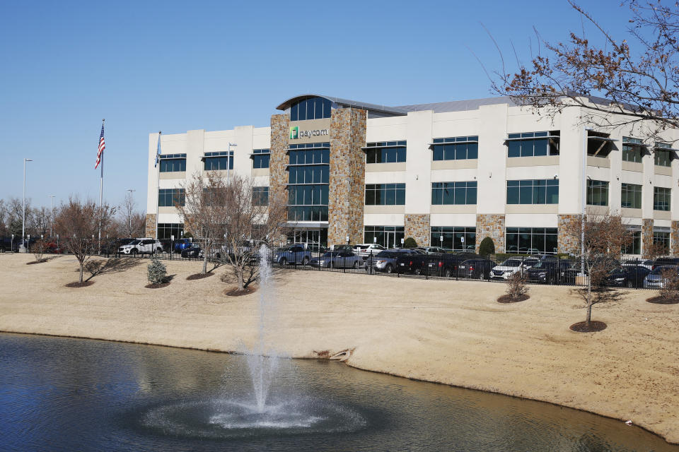 The Paycom campus is pictured Monday, Nov. 25, 2019, in Oklahoma City. Company officials say they ramped-up security after a disgruntled ex-worker began frightening employees with threatening messages and social media posts. (AP Photo/Sue Ogrocki)