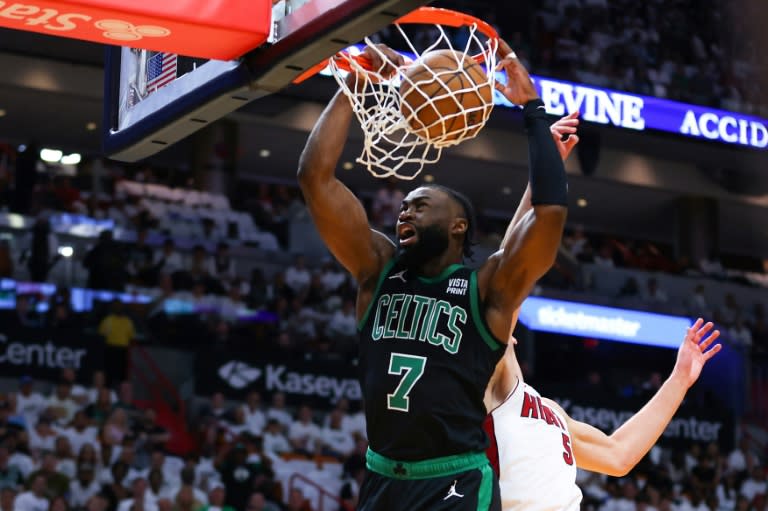 <a class="link " href="https://sports.yahoo.com/nba/players/5602/" data-i13n="sec:content-canvas;subsec:anchor_text;elm:context_link" data-ylk="slk:Jaylen Brown;sec:content-canvas;subsec:anchor_text;elm:context_link;itc:0">Jaylen Brown</a> of the <a class="link " href="https://sports.yahoo.com/nba/teams/boston/" data-i13n="sec:content-canvas;subsec:anchor_text;elm:context_link" data-ylk="slk:Boston Celtics;sec:content-canvas;subsec:anchor_text;elm:context_link;itc:0">Boston Celtics</a> throws down a dunk over <a class="link " href="https://sports.yahoo.com/nba/players/6717/" data-i13n="sec:content-canvas;subsec:anchor_text;elm:context_link" data-ylk="slk:Nikola Jovic;sec:content-canvas;subsec:anchor_text;elm:context_link;itc:0">Nikola Jovic</a> in the Celtics' victory over the <a class="link " href="https://sports.yahoo.com/nba/teams/miami/" data-i13n="sec:content-canvas;subsec:anchor_text;elm:context_link" data-ylk="slk:Miami Heat;sec:content-canvas;subsec:anchor_text;elm:context_link;itc:0">Miami Heat</a> in game three of their NBA Eastern Conference first round playoff series (Megan Briggs)