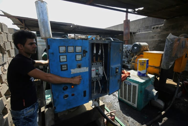 An Iraqi checks an electricity generator in Baghdad. Iraqis have denounced corruption and mismanagement that have the country's infrastructure fall apart despite the injection of billions of dollars since the 2013 US-led invasion