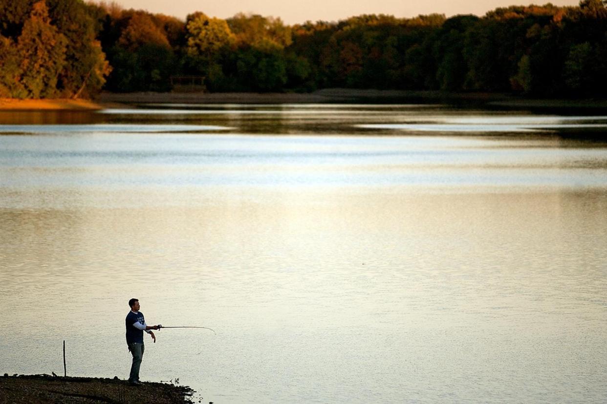 In this file photo, Casey Jacoby of Greenfield tries his hand at fishing as the sun sets on Lake Storey. A group of residents met recently to discuss improvements needed at Lake Storey in Galesburg.