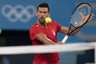 Novak Djokovic, of Serbia, practices at the Ariake Tennis Center ahead of the 2020 Summer Olympics, Wednesday, July 21, 2021, in Tokyo, Japan. (AP Photo/Alex Brandon)