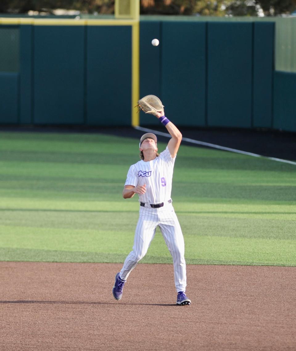 ACU's Hunter Gieser catches an infield pop fly against Texas Tech.