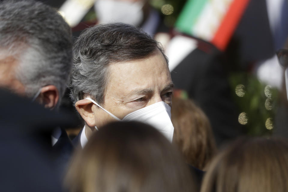 Italian Premier Mario Draghi leaves at the end of the funeral of Italian ambassador to the Democratic Republic of Congo Luca Attanasio and Italian Carabinieri police officer Vittorio Iacovacci, in Rome, Thursday, Feb. 25, 2021. Italy paid tribute Thursday to its ambassador to Congo and his bodyguard who were killed in an attack on a U.N. convoy, honoring them with a state funeral and prayers for peace in Congo and all nations "torn by war and violence." (AP Photo/Andrew Medichini)