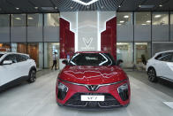 This photo shows Vinfast electric cars displayed in a showroom in Hanoi, Vietnam on June 10, 2024. Vietnamese automaker VinFast just can’t sell enough cars, so it's hoping its tiniest and cheapest car yet — a roughly 10-foot-long mini-SUV priced at $9,200 and called the VF3 — will become Vietnam's “national car" and win over consumers in Asian markets. (AP Photo/Hau Dinh)