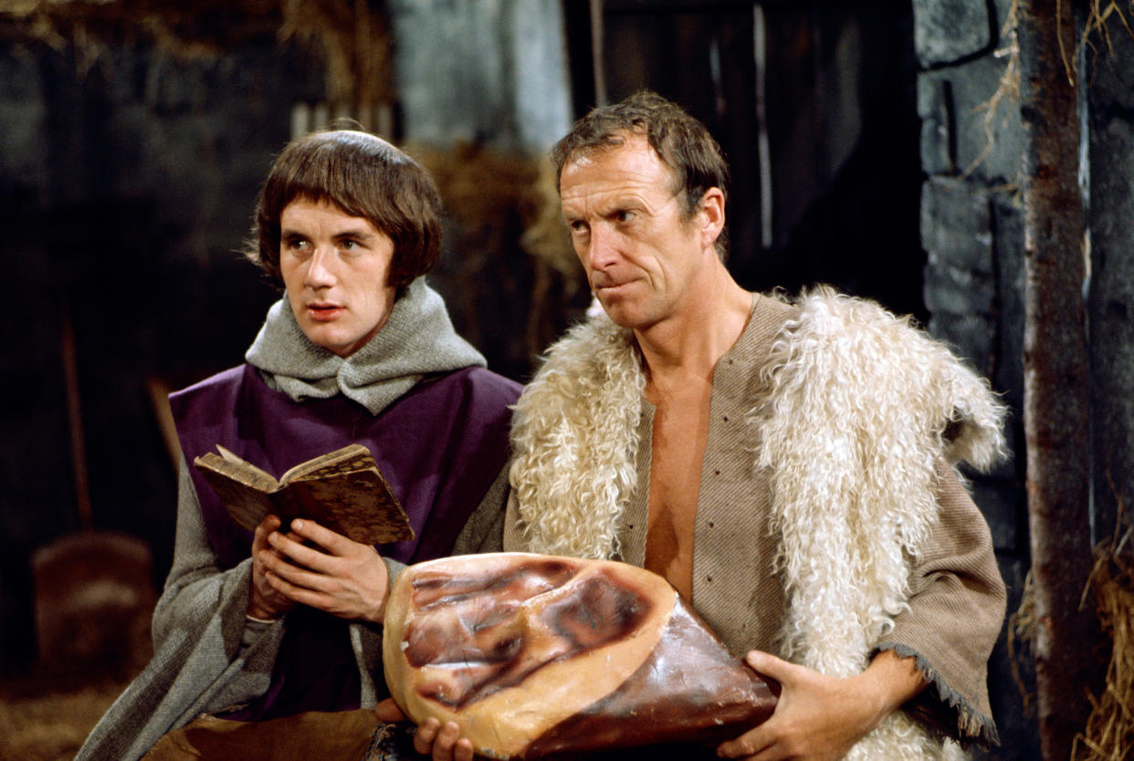 Michael Palin with Wallas Eaton in The Complete and Utter History of Britain. (Shutterstock/ITV)