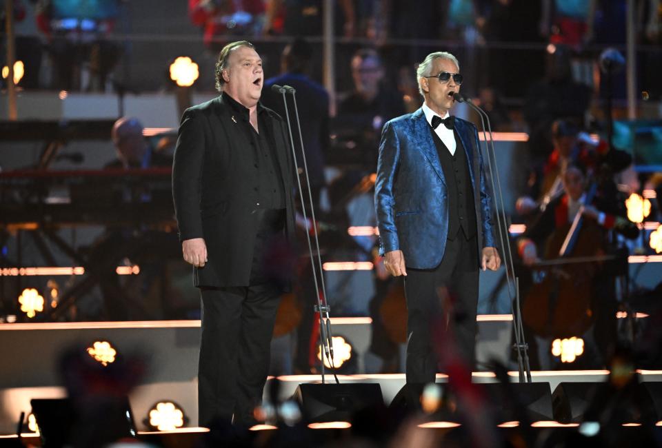 Sir Bryn Terfel (L) and Andrea Bocelli perform on stage during the Coronation Concert on May 7, 2023 in Windsor, England.