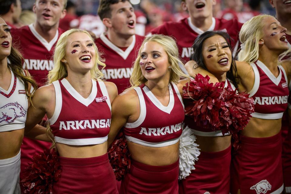 Sep 25, 2021; Arlington, Texas, USA; The Arkansas Razorbacks cheerleaders celebrate the win over the Texas A&M Aggies at AT&T Stadium. Mandatory Credit: <a class="link " href="https://sports.yahoo.com/ncaaf/players/332427" data-i13n="sec:content-canvas;subsec:anchor_text;elm:context_link" data-ylk="slk:Jerome;sec:content-canvas;subsec:anchor_text;elm:context_link;itc:0">Jerome</a> Miron-USA TODAY Sports