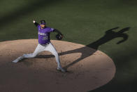 Colorado Rockies starting pitcher German Marquez works against the San Diego Padres during the second inning of a baseball game Saturday, July 31, 2021, in San Diego. (AP Photo/Derrick Tuskan)