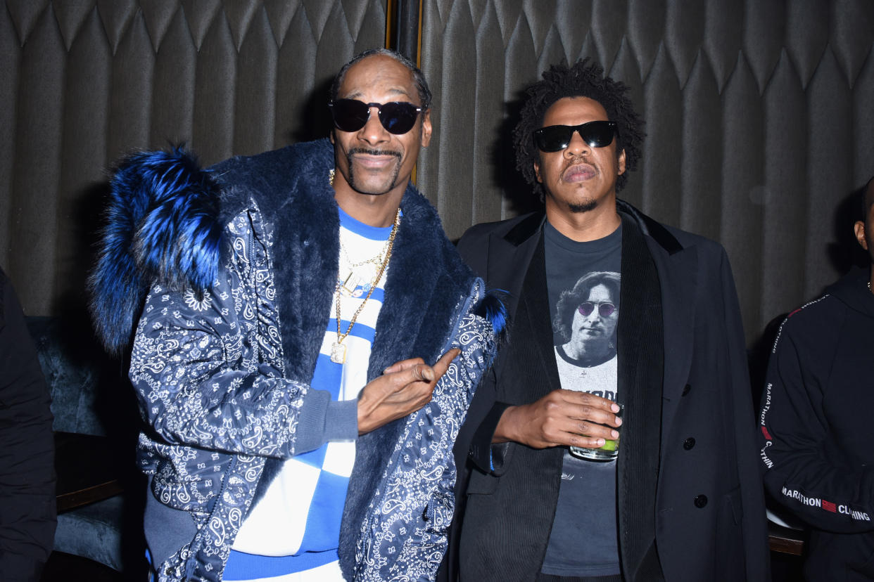 LOS ANGELES, CA - JANUARY 16:  Snoop Dogg (L) and Jay-Z attend the PUMA x Nipsey Hussle 2019 Grammy Nomination Party at The Peppermint Club on January 16, 2019 in Los Angeles, California.  (Photo by Vivien Killilea/Getty Images for PUMA)