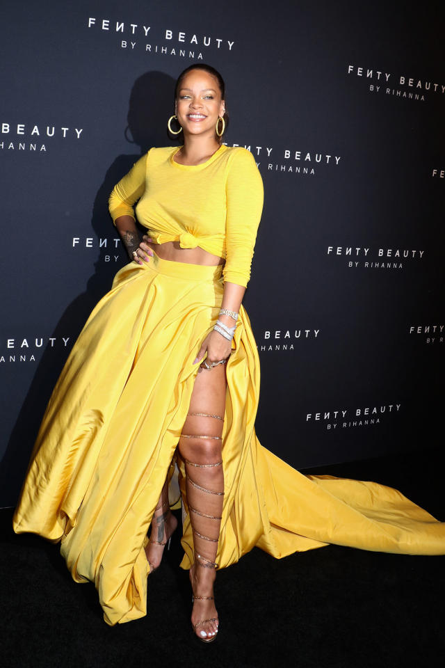 Rihanna at Fenty Beauty event in Dubai wearing an Oscar de la Renta coat  dress.