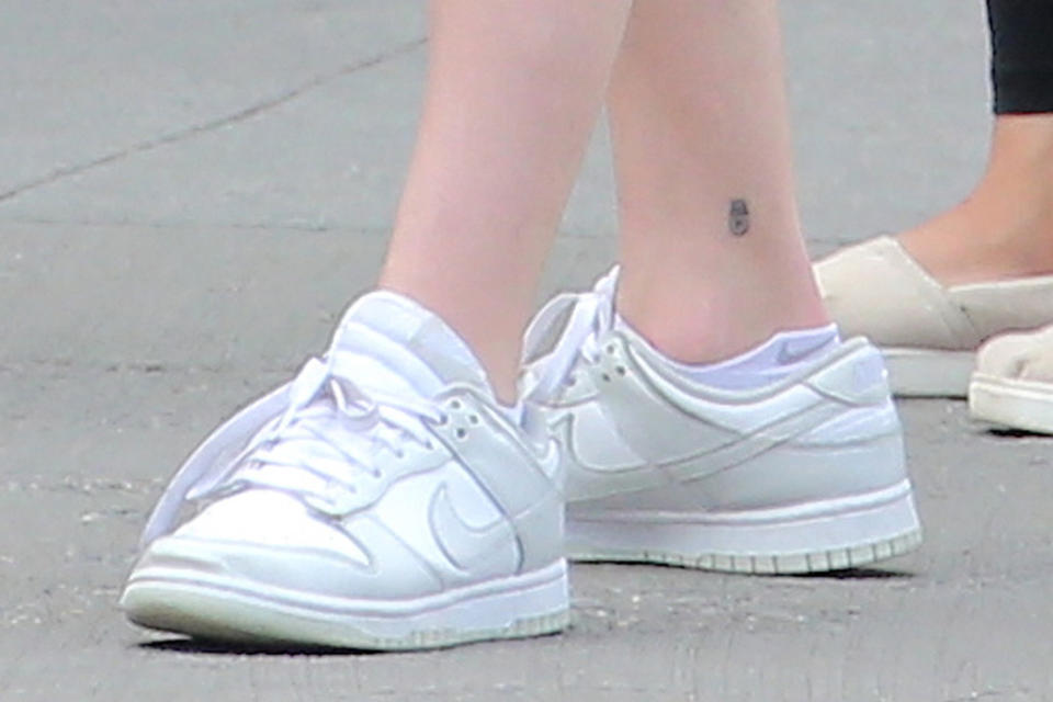 A closer view of Sophie Turner’s sneakers. - Credit: Splash News