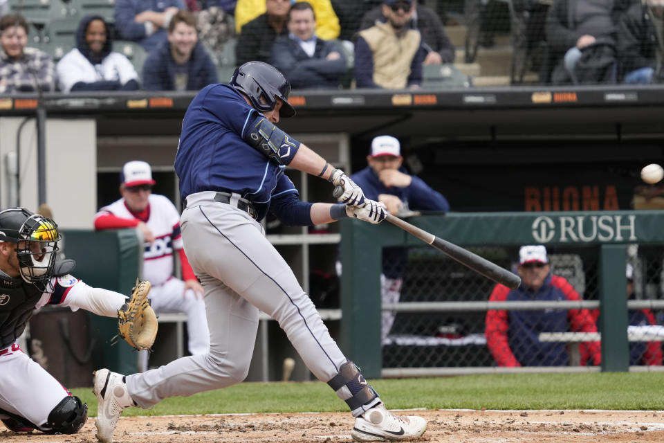 Tampa Bay Rays' Luke Raley hits a solo home run during the fourth inning of a baseball game against the Chicago White Sox in Chicago, Sunday, April 30, 2023. (AP Photo/Nam Y. Huh)