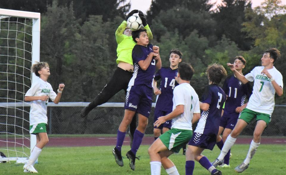 Little Falls goalkeeper Dylan Longwell breaks up a Herkimer corner kick during the second half of Tuesday's victory.