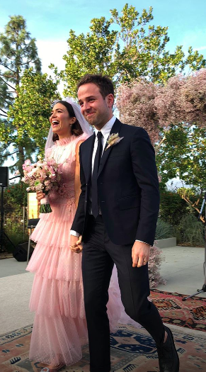 <p>The ‘This Is Us’ star tied the knot with American musician Taylor Goldsmith wearing a pink, tulle gown by Rodarte. Featuring a ruffled neck and a tiered skirt, the gown was a step away from most traditional white gowns – and suited the 34-year-old perfectly.<em> [Photo: Instagram/Mandy Moore]</em> </p>
