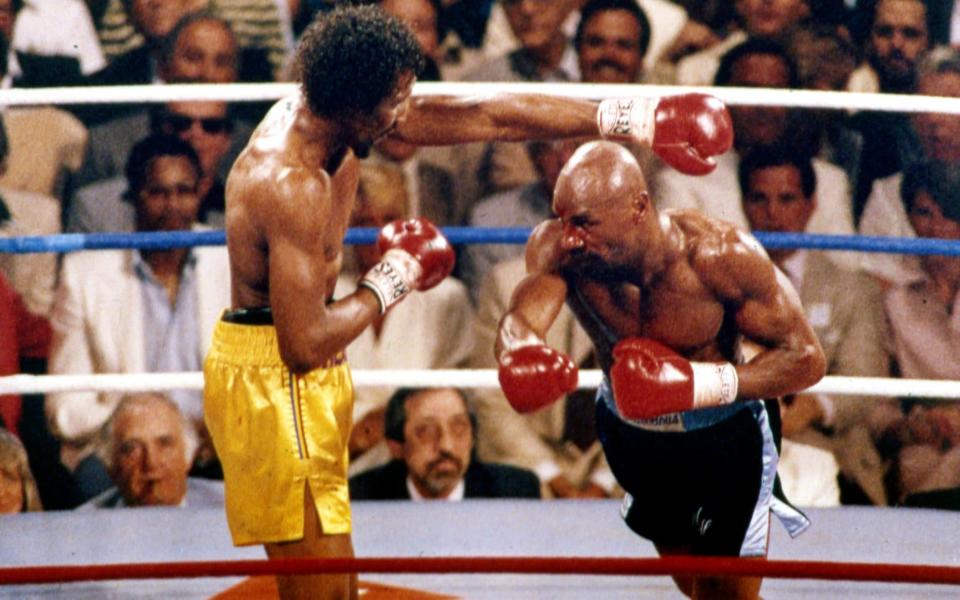 Hagler on his way to victory over Thomas 'Hitman' Hearns in 1985 - AP