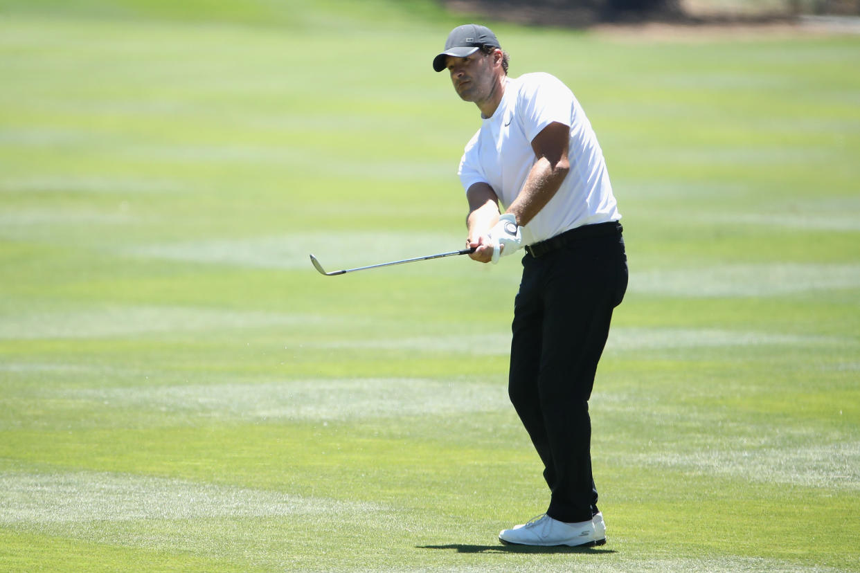 SOUTH LAKE TAHOE, NEVADA - JULY 11: Former NFL athlete Tony Romo with the Dallas Cowboys chips up to the ninth green during round two of the American Century Championship at Edgewood Tahoe South golf course on July 11, 2020 in South Lake Tahoe, Nevada. (Photo by Christian Petersen/Getty Images)