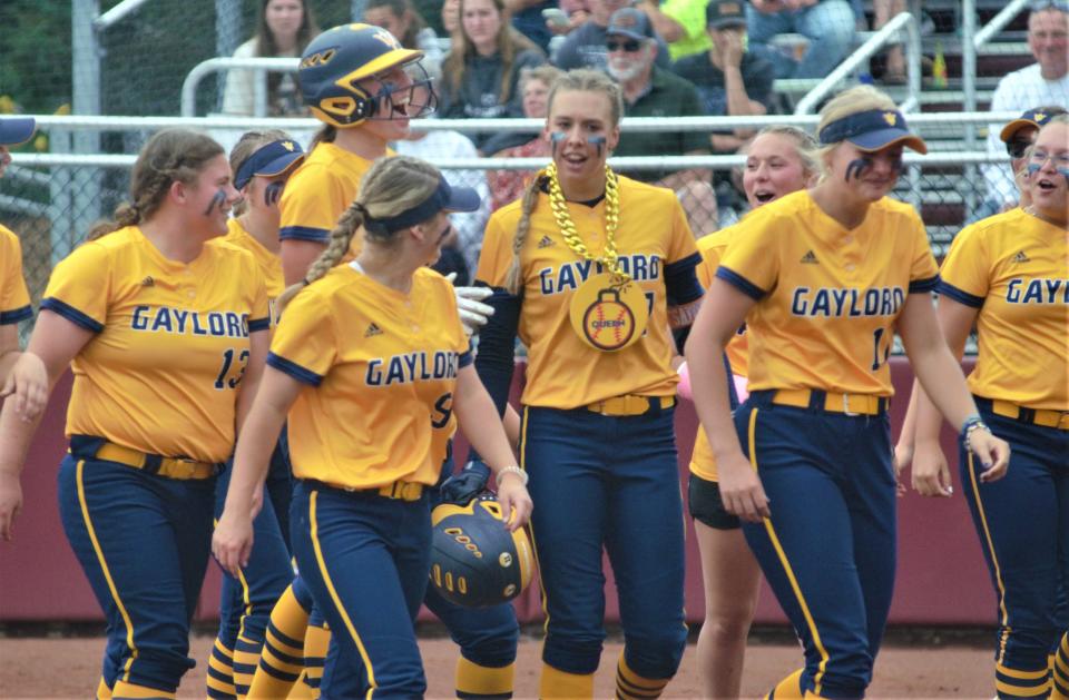 Gaylord celebrates Aubrey Jones's clutch home run during an MHSAA Division 2 softball state quarterfinal matchup between Gaylord and Hudsonville Unity Christian on Tuesday, June 13 at Margo Jonker Stadium on the campus of Central Michigan University, Mount Pleasant, Mich.