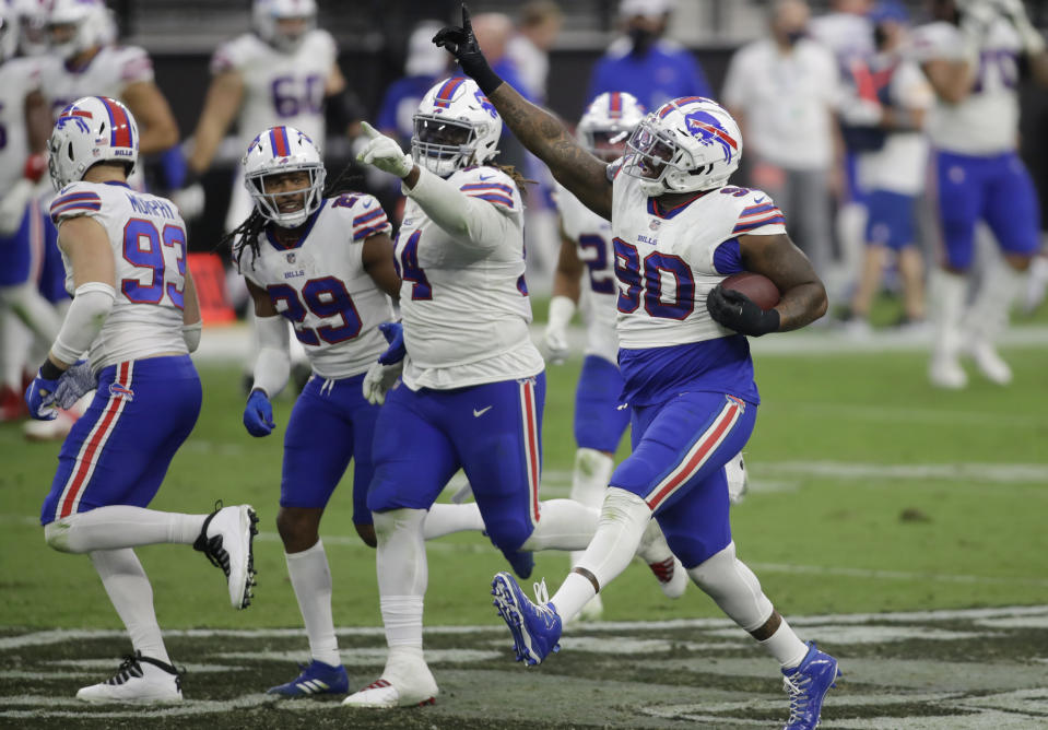 FILE - In this Oct. 4, 2020, file photo, Buffalo Bills defensive tackle Quinton Jefferson (90) celebrates after recovering a fumble by the Las Vegas Raiders during the second half of an NFL football game in Las Vegas. (AP Photo/Isaac Brekken, File)