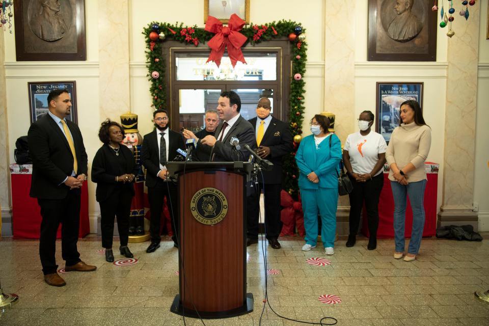 Paterson Mayor Andre Sayegh introduces the members of "The Mayor's Citizen Task Force on De-Escalation and Police Practices" at City Hall in Paterson, N.J. on Thursday Dec. 2, 2021.