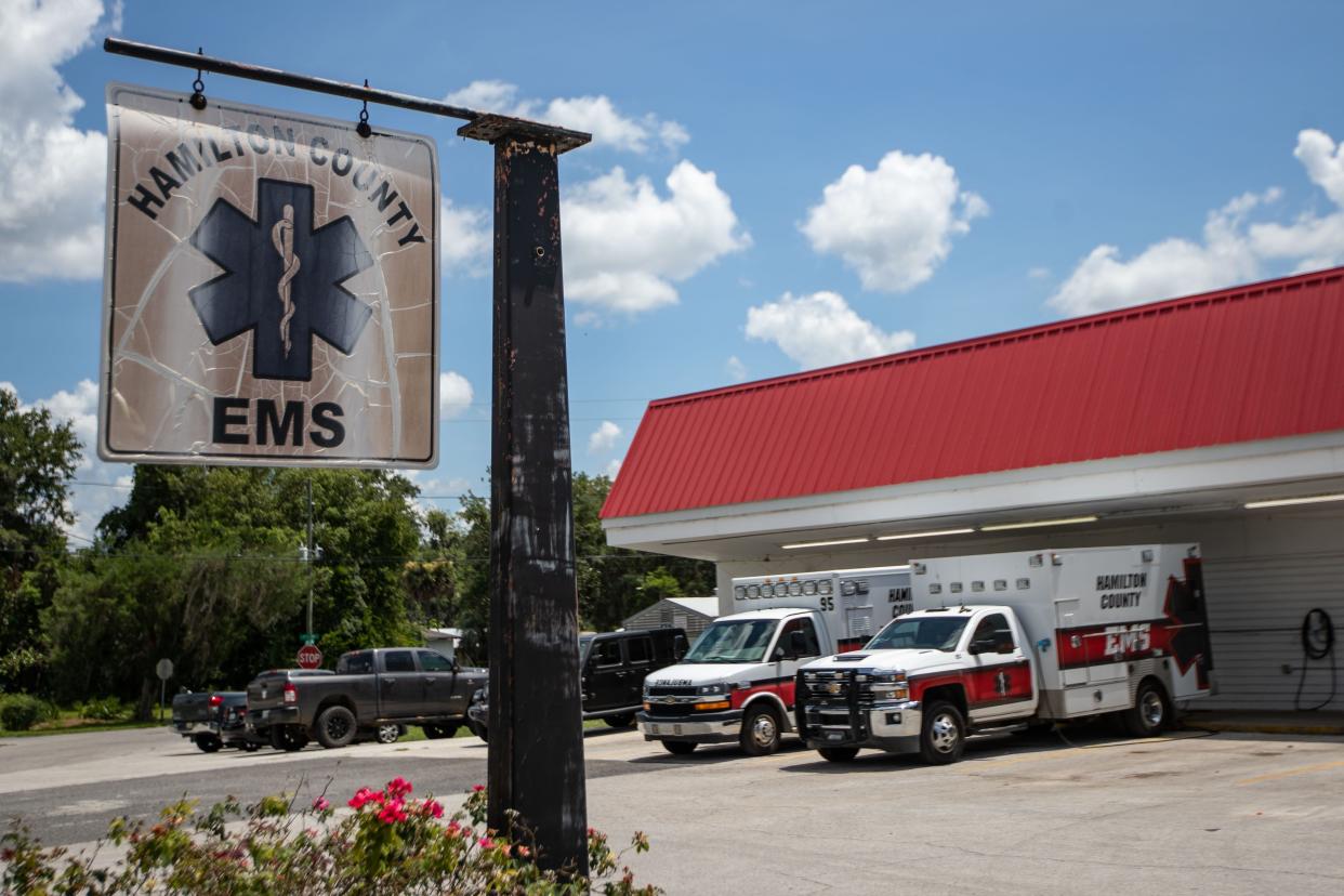 Two Hamilton County Emergency Medical Services ambulances sit parked outside the EMS building in Jasper, Florida on Wednesday, July 6, 2022.