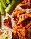 <p>Quicker to make and easier to eat than <a href="https://www.delish.com/cooking/recipe-ideas/recipes/a51133/classic-buffalo-wings-recipe/" rel="nofollow noopener" target="_blank" data-ylk="slk:Buffalo chicken wings;elm:context_link;itc:0;sec:content-canvas" class="link ">Buffalo chicken wings</a>, this <a href="https://www.delish.com/cooking/recipe-ideas/g39431167/plant-based-recipes/" rel="nofollow noopener" target="_blank" data-ylk="slk:plant-based;elm:context_link;itc:0;sec:content-canvas" class="link ">plant-based</a> version swaps chicken for snackable triangles of <a href="https://www.delish.com/food-news/a40973028/what-is-tempeh/" rel="nofollow noopener" target="_blank" data-ylk="slk:tempeh;elm:context_link;itc:0;sec:content-canvas" class="link ">tempeh</a> to mimic the crowd-pleasing appetizer.</p><p>Get the <strong><a href="https://www.delish.com/cooking/recipe-ideas/a36973370/tempeh-wings-recipe/" rel="nofollow noopener" target="_blank" data-ylk="slk:Tempeh Buffalo “Wings” recipe;elm:context_link;itc:0;sec:content-canvas" class="link ">Tempeh Buffalo “Wings” recipe</a></strong>.</p>