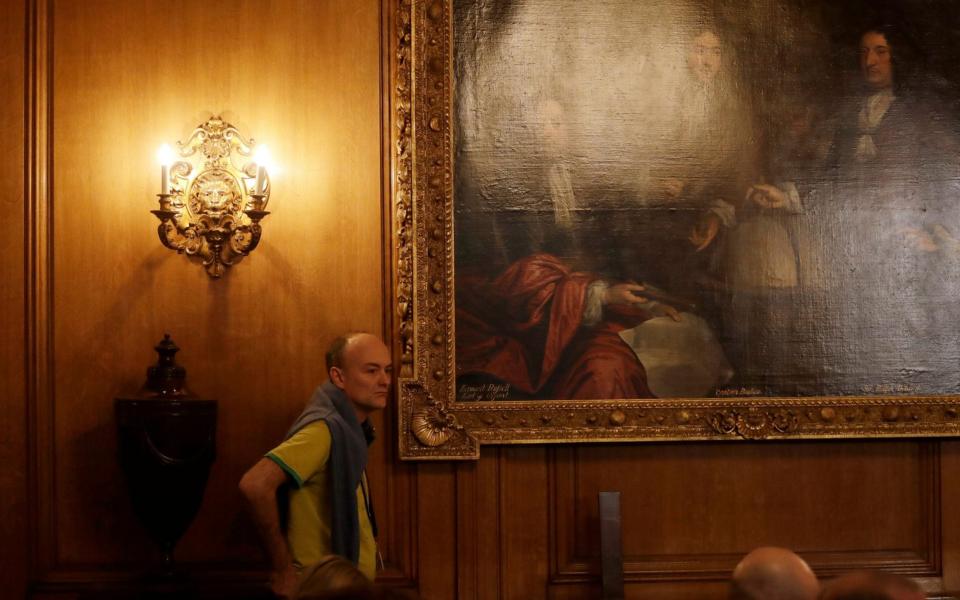 Dominic Cummings, special adviser to British Prime Minister Boris Johnson looks on during Johnson's news conference about the ongoing situation with the COVID-19 coronavirus outbreak inside 10 Downing Street in London - Shutterstock