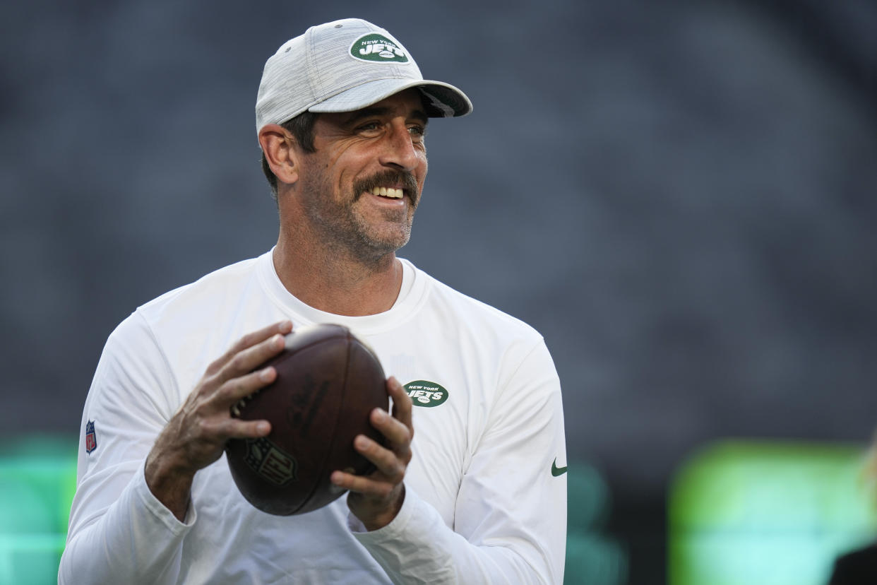 New York Jets quarterback Aaron Rodgers warms up before a preseason NFL football game against the Tampa Bay Buccaneers , Saturday, Aug. 19, 2023, in East Rutherford, N.J. (AP Photo/Seth Wenig)