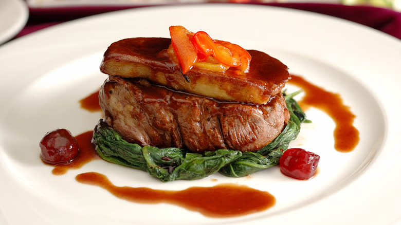 Steak topped with foie gras