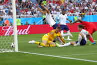 <p>…but Gary Cahill reacts fastest to clear the ball off the line and spare their blushes </p>