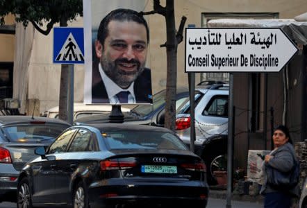 A poster depicting Saad al-Hariri, who announced his resignation as Lebanon's prime minister from Saudi Arabia, is seen in Beirut, Lebanon November 17, 2017. REUTERS/Jamal Saidi