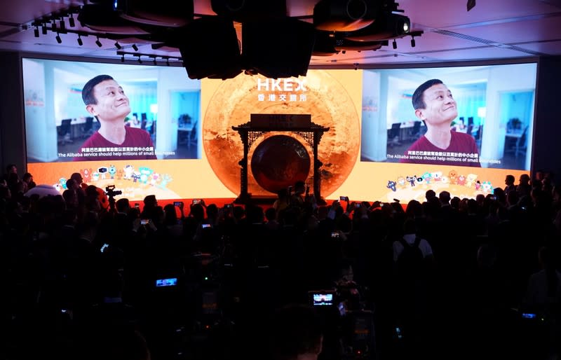 Alibaba's co-founder Jack Ma is seen on the screen at Alibaba Group's listing ceremony at the Hong Kong Stock Exchange (HKEX) in Hong Kong