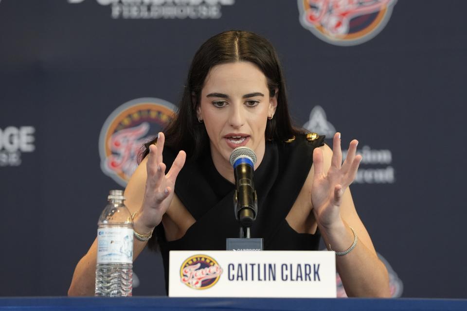 Indiana Fever's Caitlin Clark speaks during a WNBA basketball news conference, Wednesday, April 17, 2024, in Indianapolis. (AP Photo/Darron Cummings)