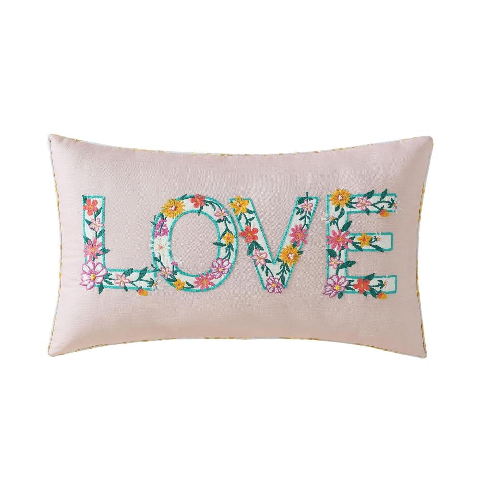 <p><a href="https://go.redirectingat.com?id=74968X1596630&url=https%3A%2F%2Fwww.walmart.com%2Fip%2FThe-Pioneer-Woman-Embroidered-Floral-Decorative-Pillow-Love-14-x-24%2F2454408924&sref=https%3A%2F%2F" rel="nofollow noopener" target="_blank" data-ylk="slk:Shop Now;elm:context_link;itc:0;sec:content-canvas" class="link ">Shop Now</a></p><p>The Pioneer Woman Embroidered Floral Decorative Pillow</p><p>walmart.com</p><p>$19.98</p>