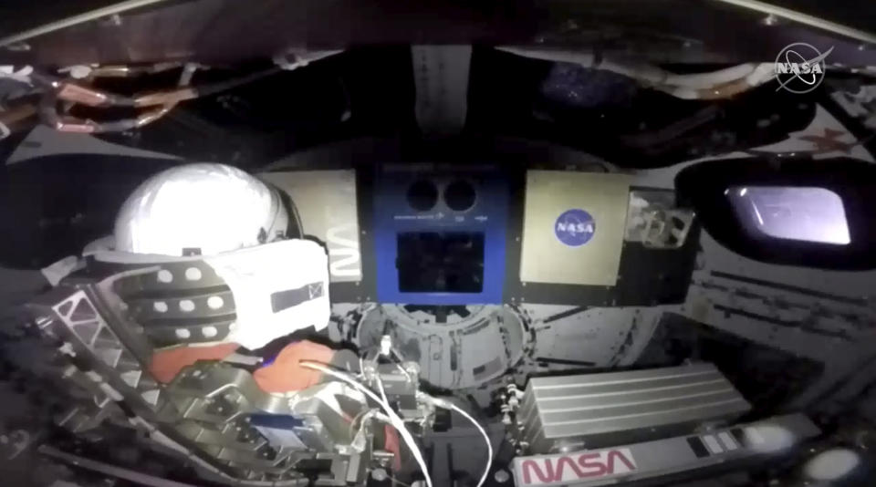 This screengrab from NASA shows inside the NASA moon rocket, an un-crewed test flight, on Wednesday, Nov. 16, 2022. NASA's new moon rocket blasted off on its debut flight with three test dummies aboard Wednesday, bringing the U.S. a big step closer to putting astronauts back on the lunar surface for the first time since the end of the Apollo program 50 years ago. (NASA via AP)