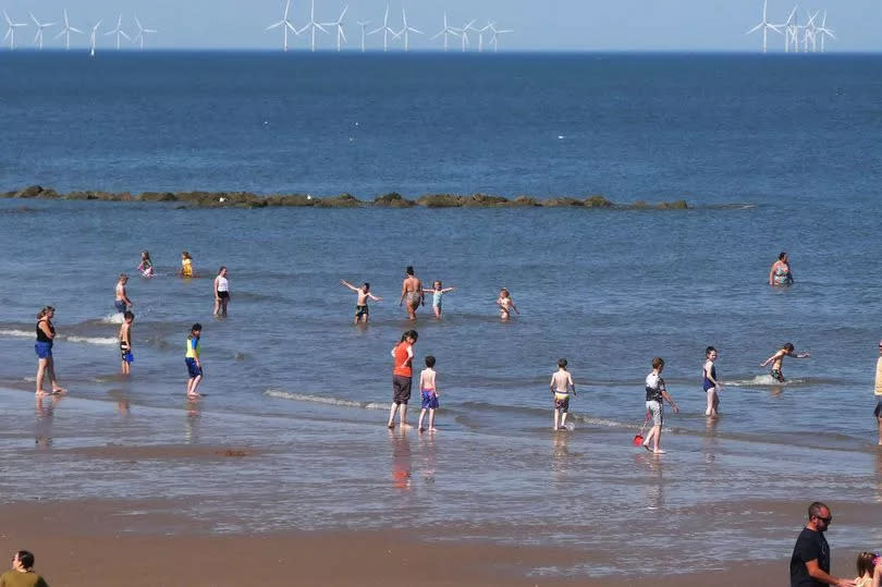 The beach at Prestatyn is a popular spot on warm summer days