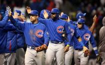 Oct 26, 2016; Cleveland, OH, USA; Chicago Cubs players Ben Zobrist and Jason Heyward celebrate after defeating the Cleveland Indians in game two of the 2016 World Series at Progressive Field. Charles LeClaire-USA TODAY Sports