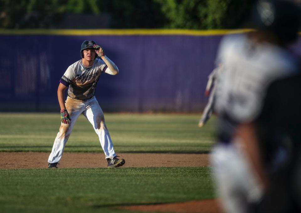 Shadow Hills' Jeremiah Peffers (18) keeps his eyes on the ball as he leads off of second base during their round-one CIF-SS game at Shadow Hills High School in Indio, Calif., Thursday, May 4, 2023. 