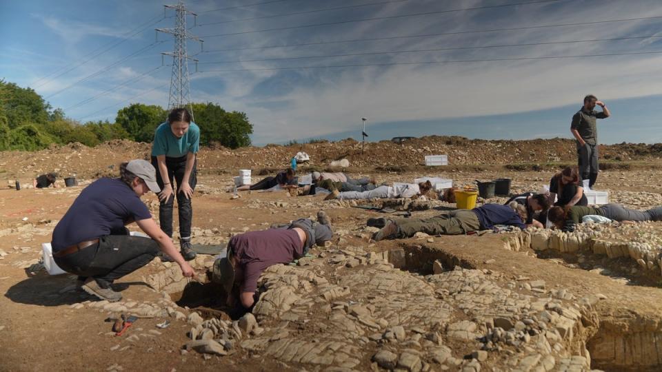 The researchers estimate there are about 70 graves at the site - 18 have been excavated so far (BBC News & Current Affairs via Getty)