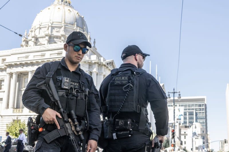 Heavily armed police stand st an intersection by City Hall at the funeral of Sen. Diane Feinstein In San Francisco on Thursday, October 5, 2023. Authorities closed the Civic Center to the public as services were held for the Senator and former mayor of the city onthe steps of City Hall. Photo by Terry Schmitt/UPI