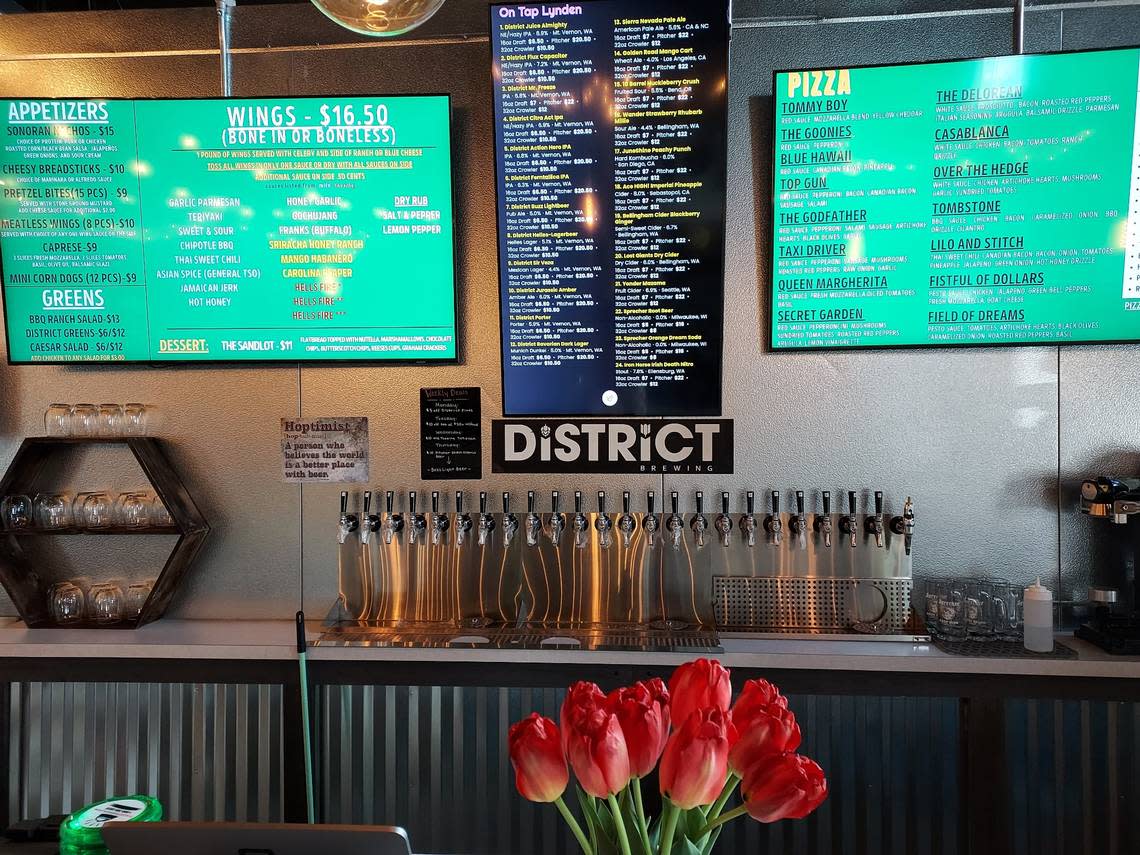 The menu and beer taps at District Brewing Co. at 6912 Hannegan Rd. in Lynden, Wash.