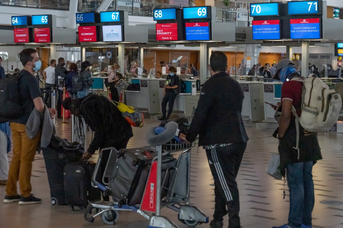 Flight check: Passengers at Cape Town airport  (EPA)