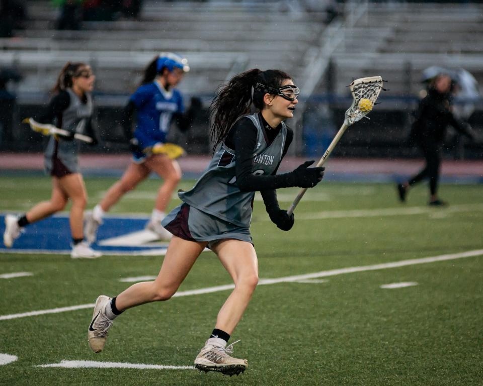 Ava Alteri goes on the offensive for Clinton during their match against the Whitesboro Warriors at Edwin Wadas Athletic Complex in Whitesboro on Thursday, April 7, 2022.