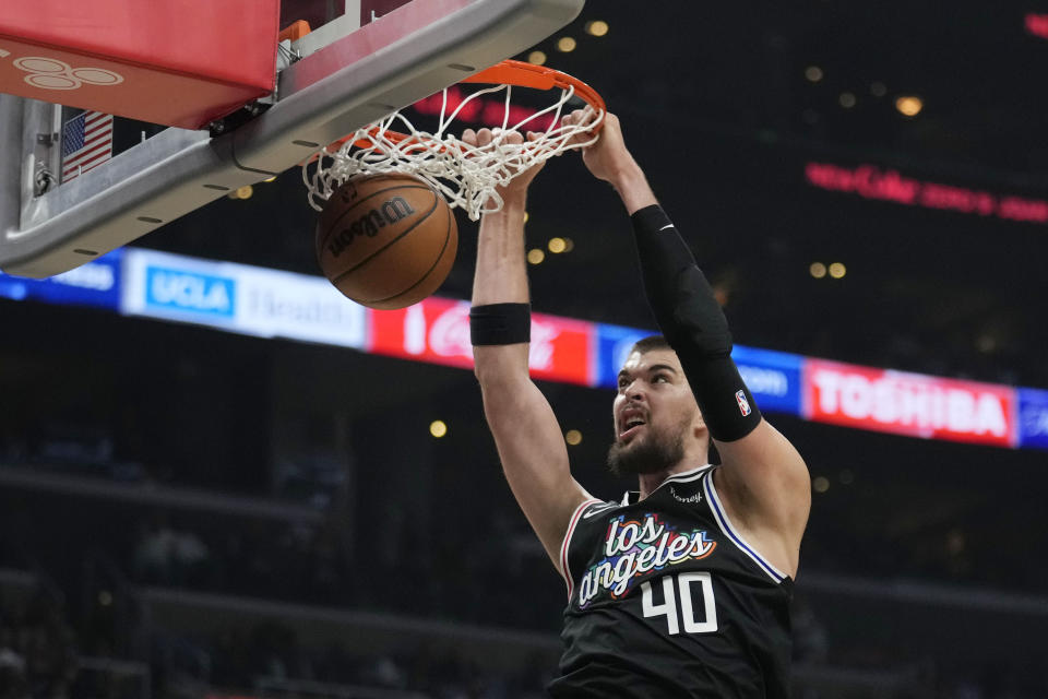 Los Angeles Clippers center Ivica Zubac (40) dunks against the Brooklyn Nets during the first half of an NBA basketball game Saturday, Nov. 12, 2022, in Los Angeles. (AP Photo/Marcio Jose Sanchez)
