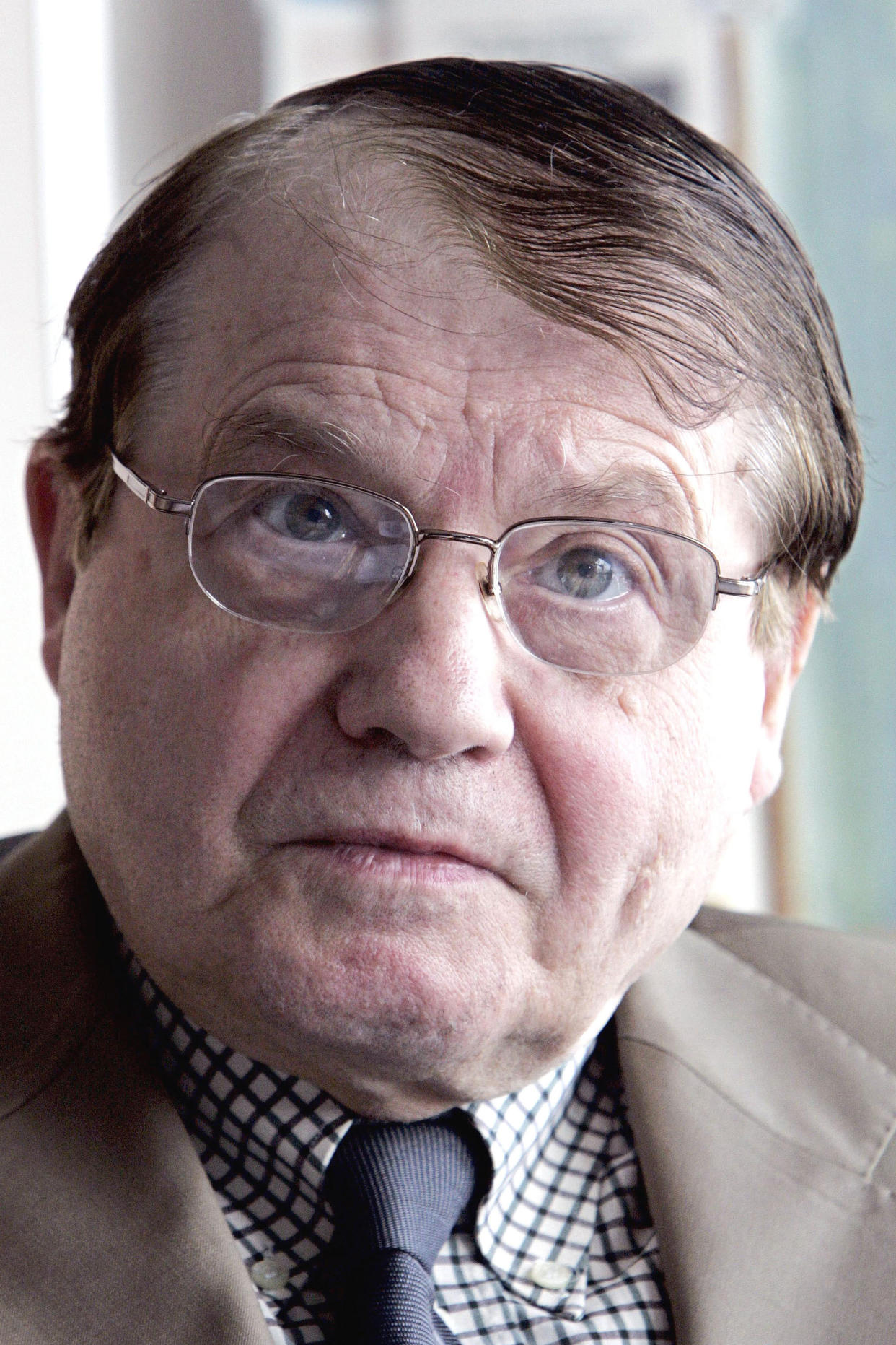 FILE - This June 5, 2006 file photo shows scientist Luc Montagnier in Paris. During an April 2020 interview with the French news channel C News, Montagnier claimed that the coronavirus did not originate in nature and was manipulated. (AP Photo/Jacques Brinon, File)