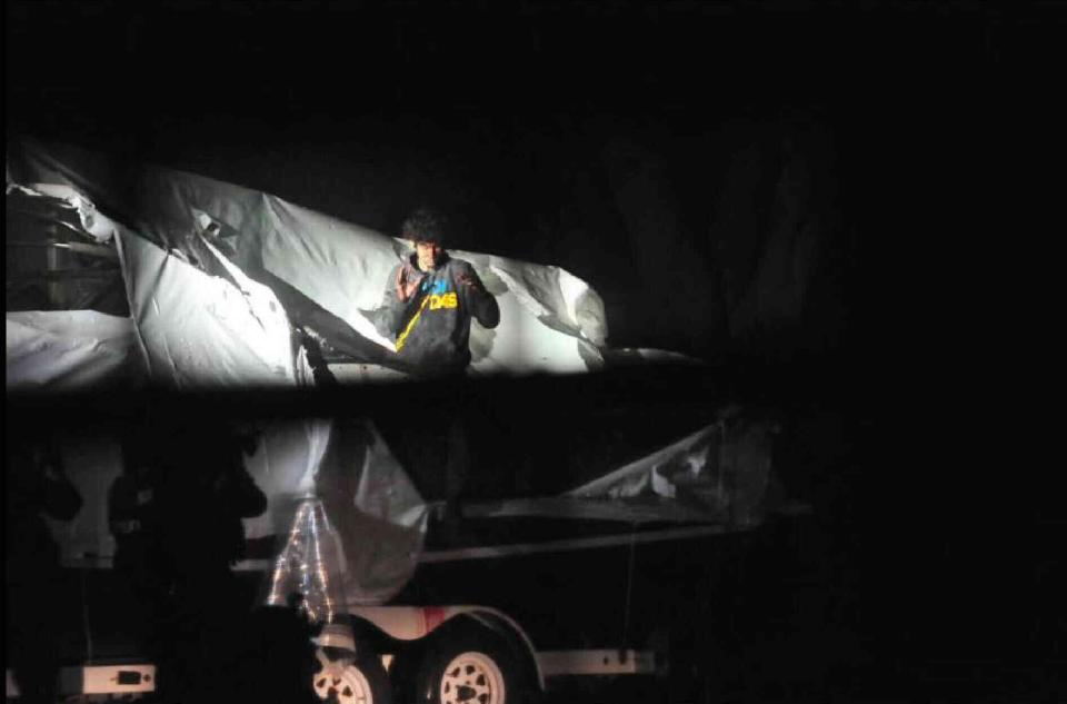 Boston Marathon bombing suspect Dzhokhar Tsarnaev is seen standing in a boat where he was apprehended by police, in a still handout image entered as evidence by the defense during his trial in Boston March 18, 2015. Tsarnaev, 21, is accused of killing three people and injuring 264 with a pair of homemade bombs at the race's crowded finish line on April 15, 2013, as well as fatally shooting a police officer three days later as he and his brother tried to flee the city. REUTERS/U.S. Attorney's Office/Handout via Reuters (UNITED STATES - Tags: CRIME LAW CIVIL UNREST) FOR EDITORIAL USE ONLY. NOT FOR SALE FOR MARKETING OR ADVERTISING CAMPAIGNS. THIS IMAGE HAS BEEN SUPPLIED BY A THIRD PARTY. IT IS DISTRIBUTED, EXACTLY AS RECEIVED BY REUTERS, AS A SERVICE TO CLIENTS