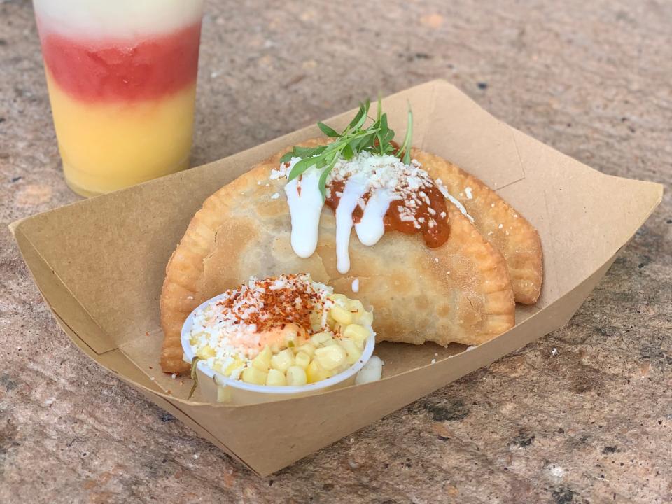 takeout boat of empanadas and a frozen margarita from the mexico pavilion at epcot