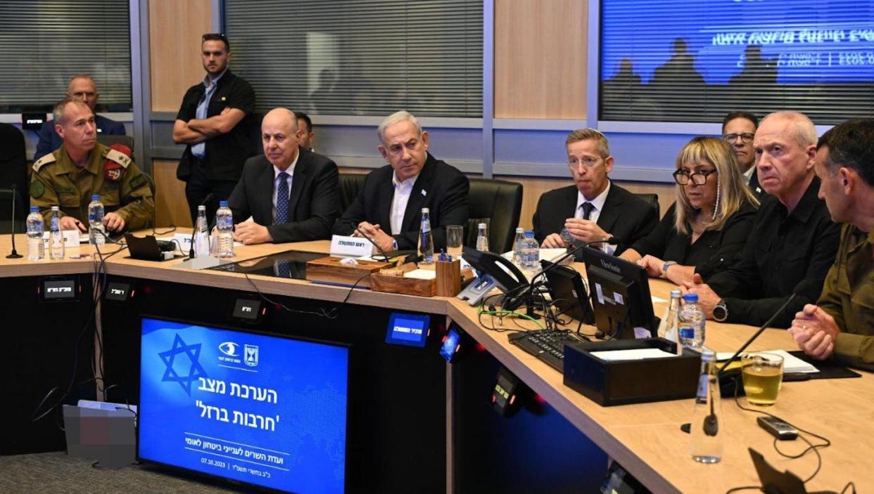 Israeli Prime Minister Benjamin Netanyahu, center, meets with his security cabinet on Oct. 7, 2023, the day of the Hamas attack. <a href="https://www.gettyimages.com/detail/news-photo/israeli-prime-minister-benjamin-netanyahu-holds-a-meeting-news-photo/1711825822" rel="nofollow noopener" target="_blank" data-ylk="slk:Haim Zach (GPO) / Handout/Anadolu Agency via Getty Images;elm:context_link;itc:0;sec:content-canvas" class="link ">Haim Zach (GPO) / Handout/Anadolu Agency via Getty Images</a>