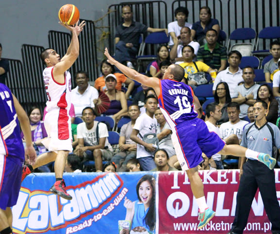 LA Tenorio with a floater over Wynne Arboleda. (PBA Images)