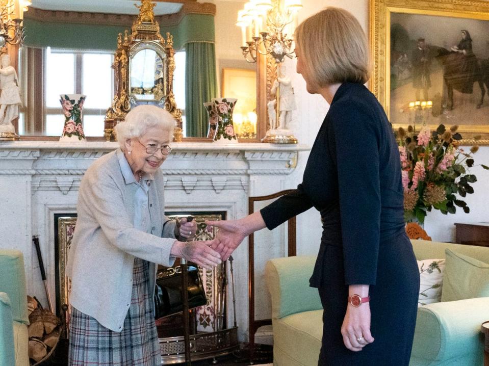 The Queen welcomes Liz Truss in one of her last public engagements before her death (PA)